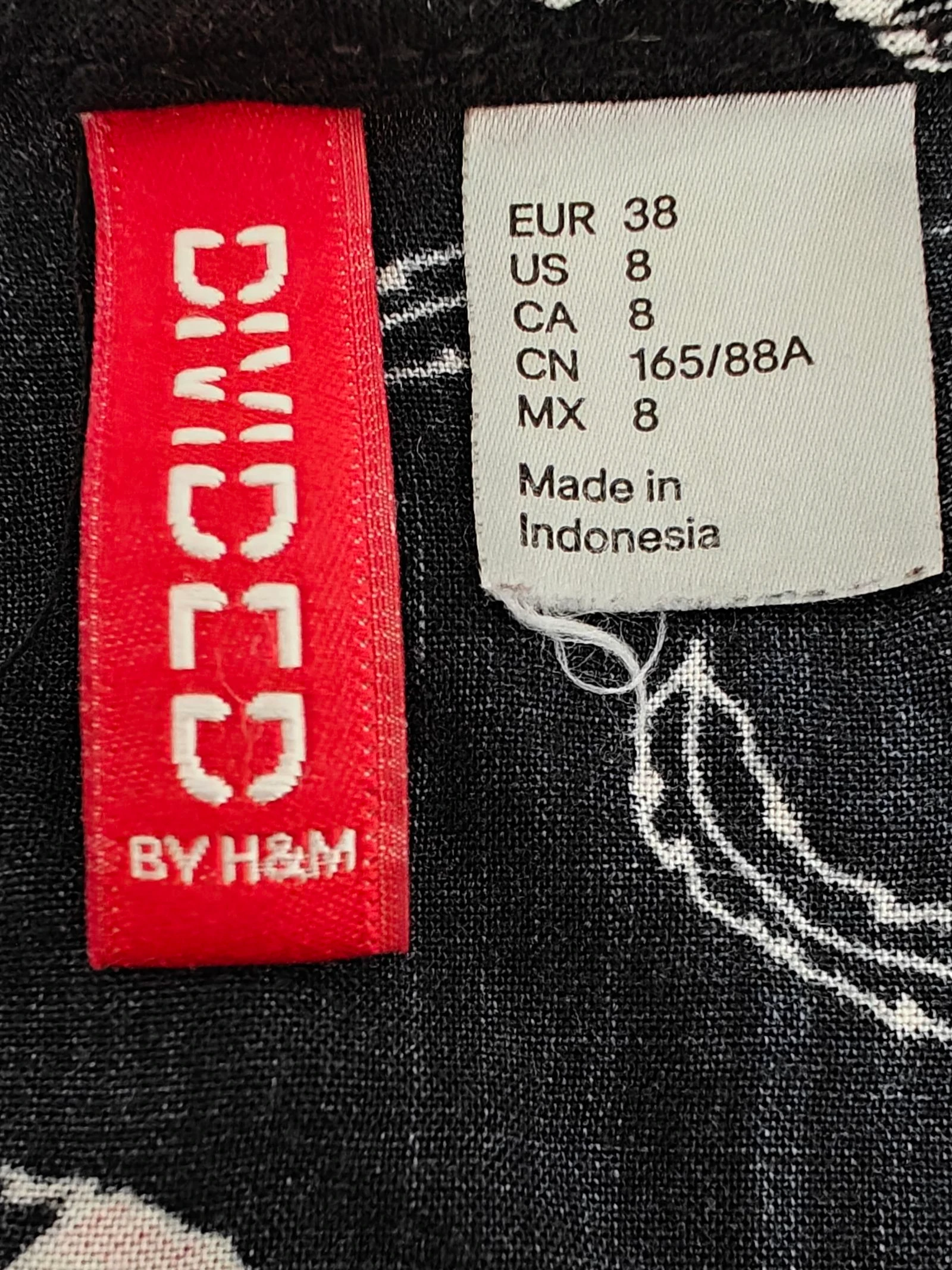 Black H&M Divided dress with feather print – photo 2